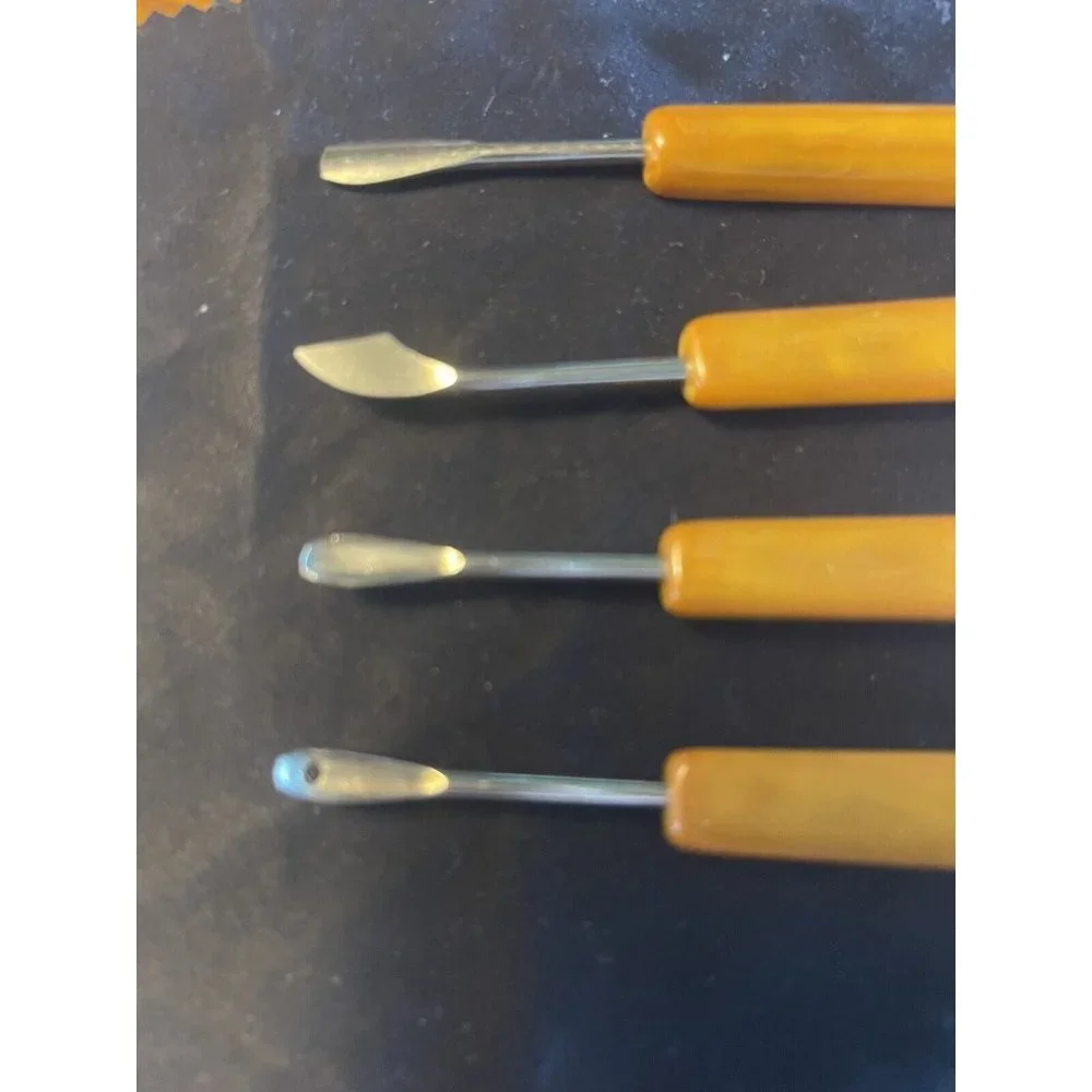 Egg Yolk Bakelite Four Piece Manicure Set